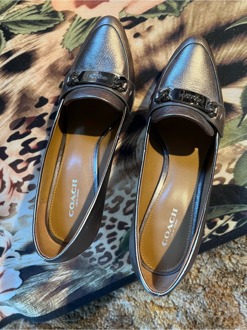 COACH Metallic Silver Calf Leather Pointed Loafers with Coach Plate Accent